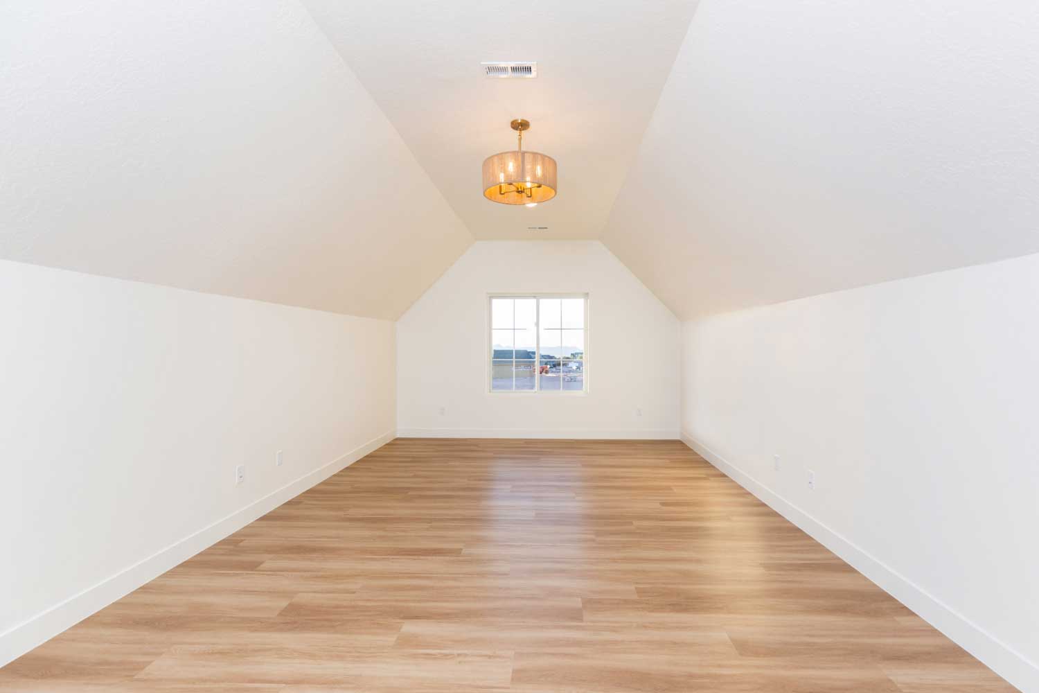 Bonus room with hardwood floors